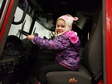 girl in firetruck